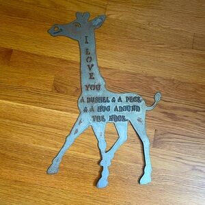 Brand new, thick metal giraffe sign with patina